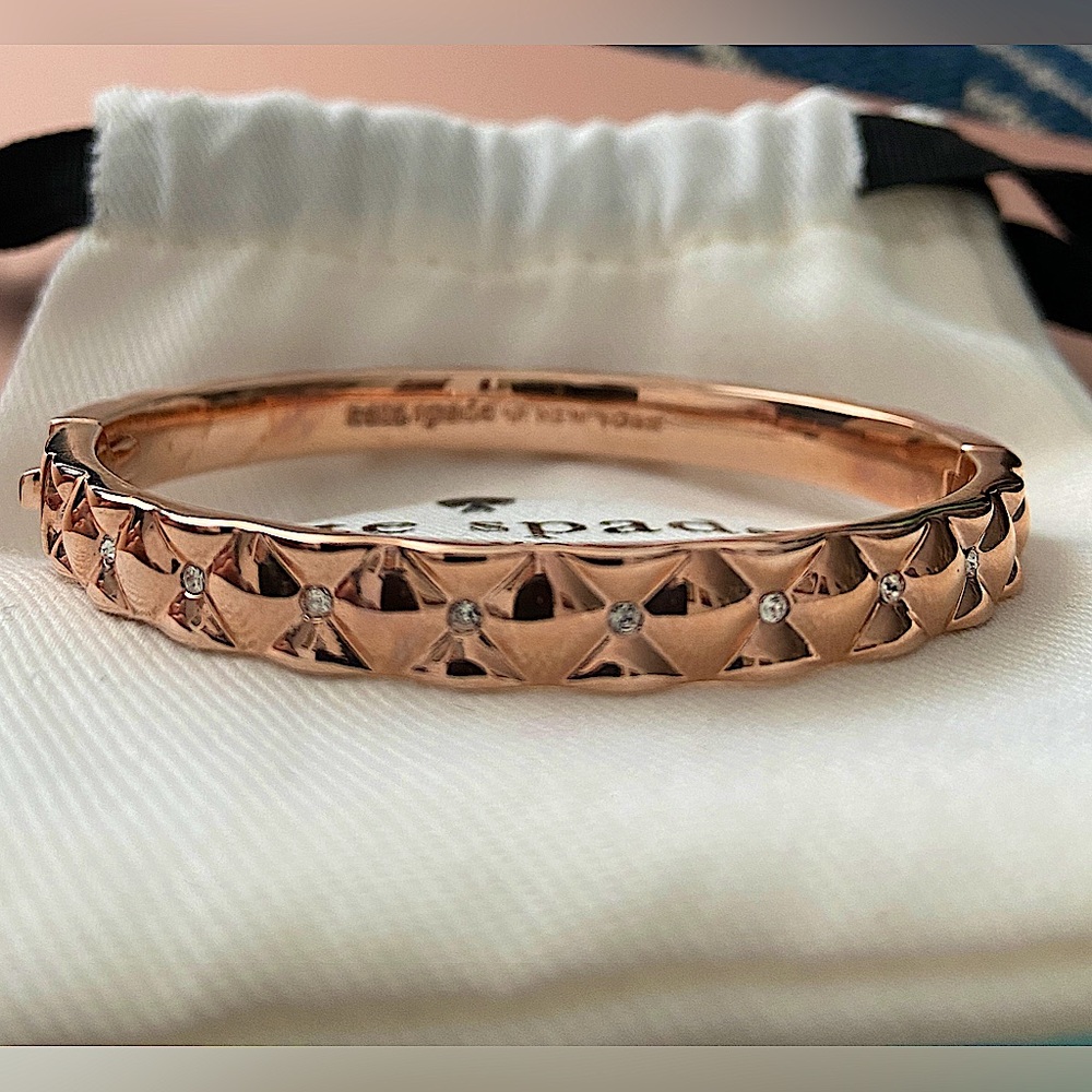Kate Spade rose gold bangle bracelet.